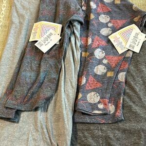 2 LuLaRoe “Randy” three-quarter sleeve tees